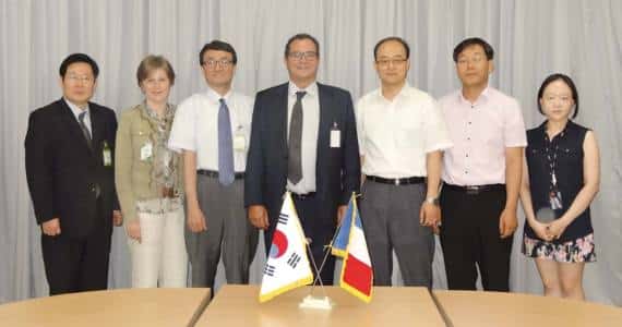 In Seoul, Valérie Chevreul and Pierre-Marie Lemer surrounded by the Shinhwa and Kaer management teams